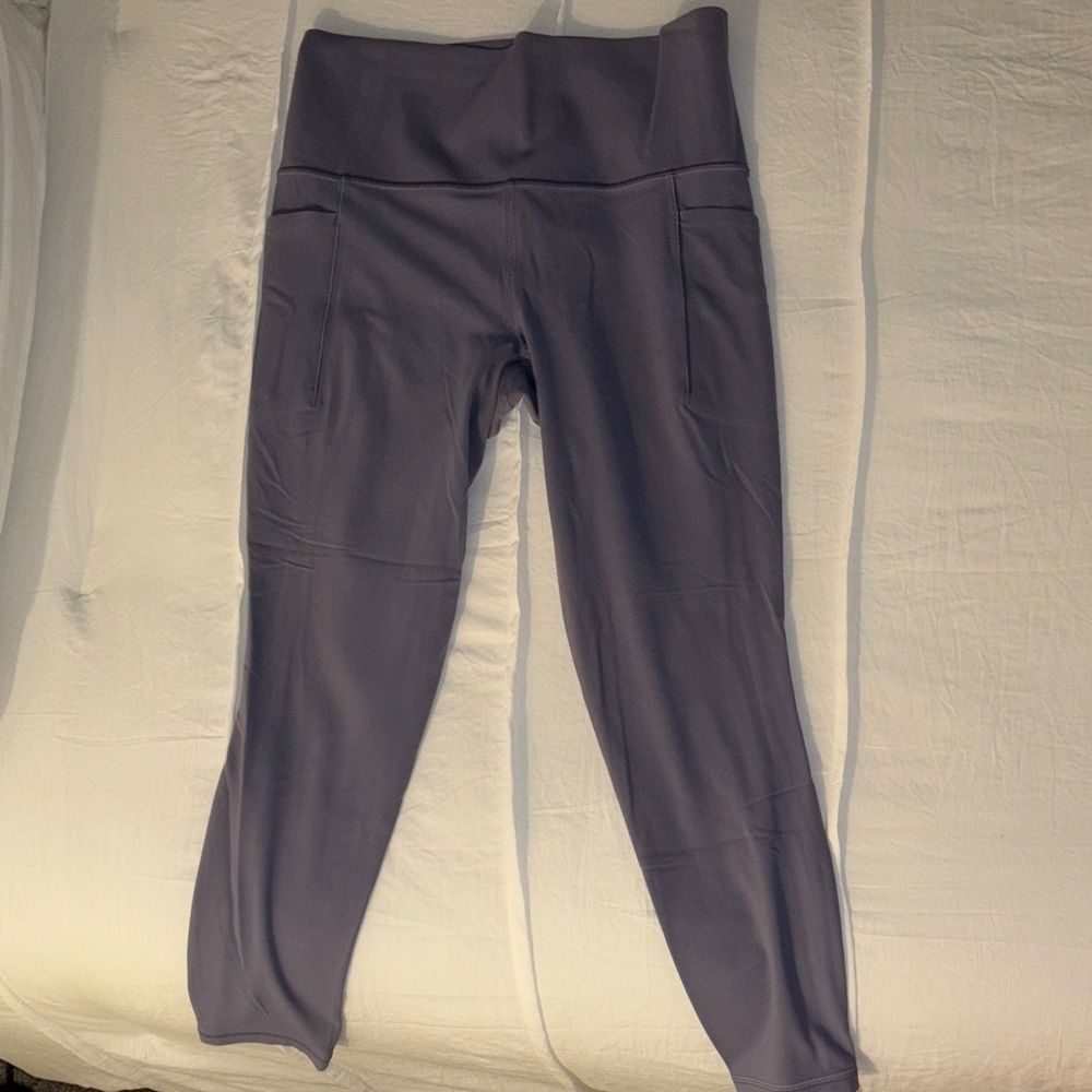 Athleta Violet Salutation Stash Pocket 7/8 Tight